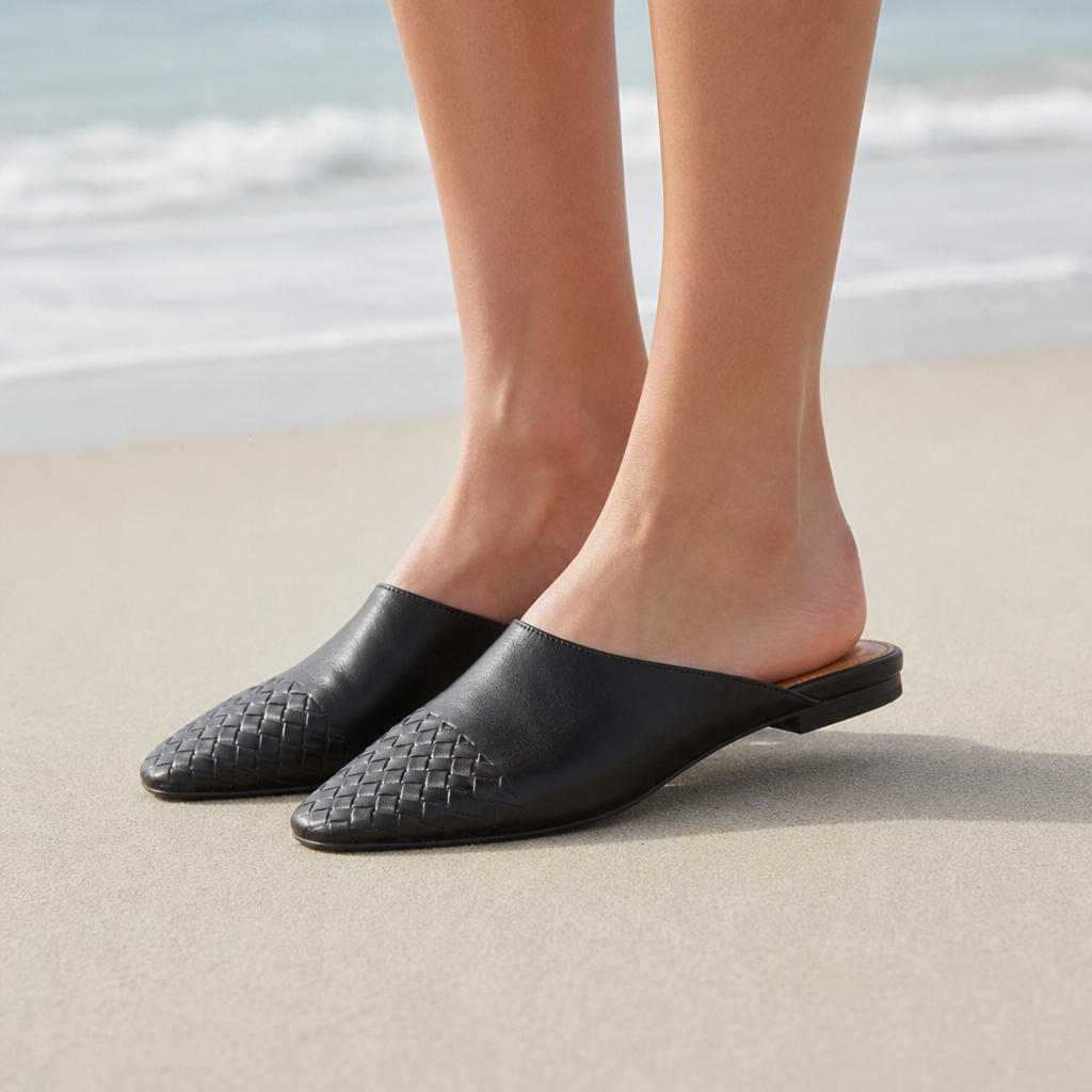 Ibiza Woven Leather Mules in Black